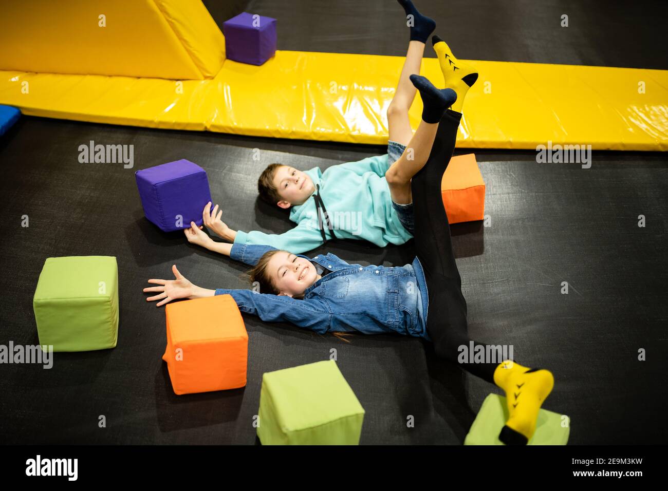 Children active leisure. Sports weekend in sports center of acrobatics and trampoline. Physical