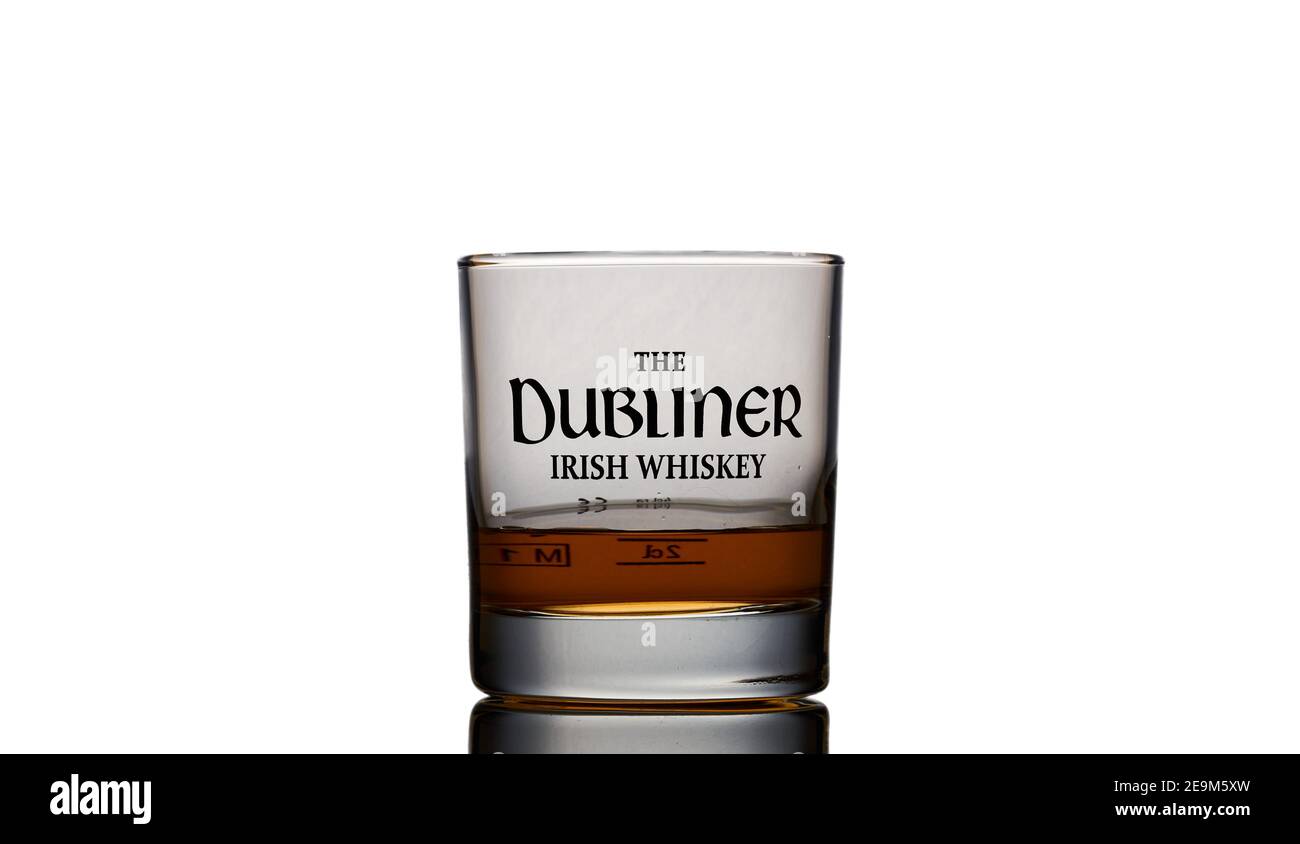 The Dubliner Irish Whisky glass white background Stock Photo