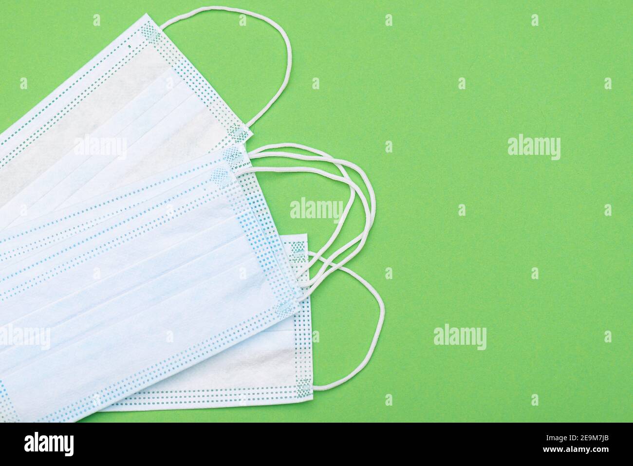 Blue medical masks on table hi-res stock photography and images - Alamy