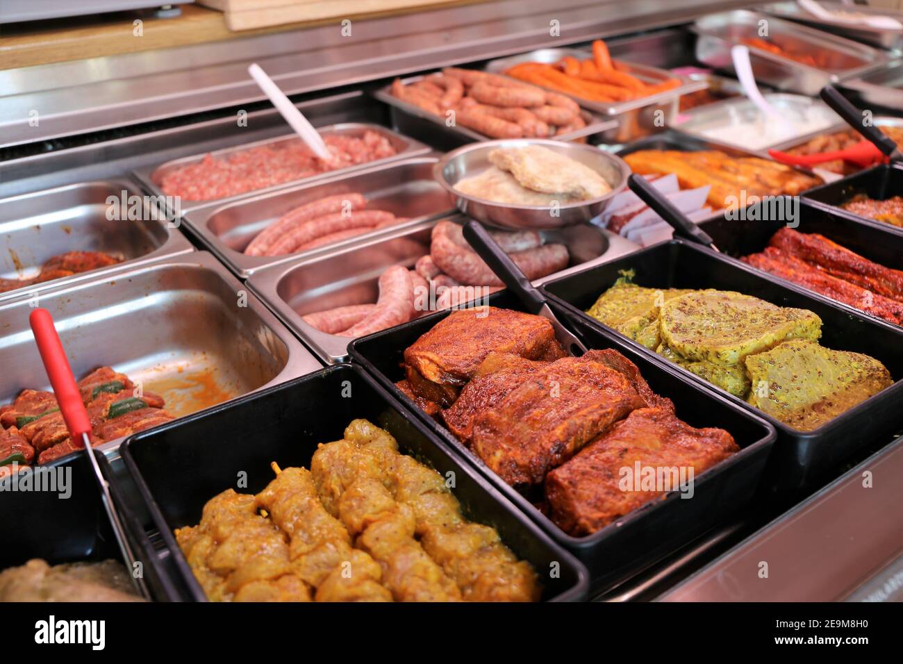 Variety of fine meat products in the butchery Stock Photo Alamy