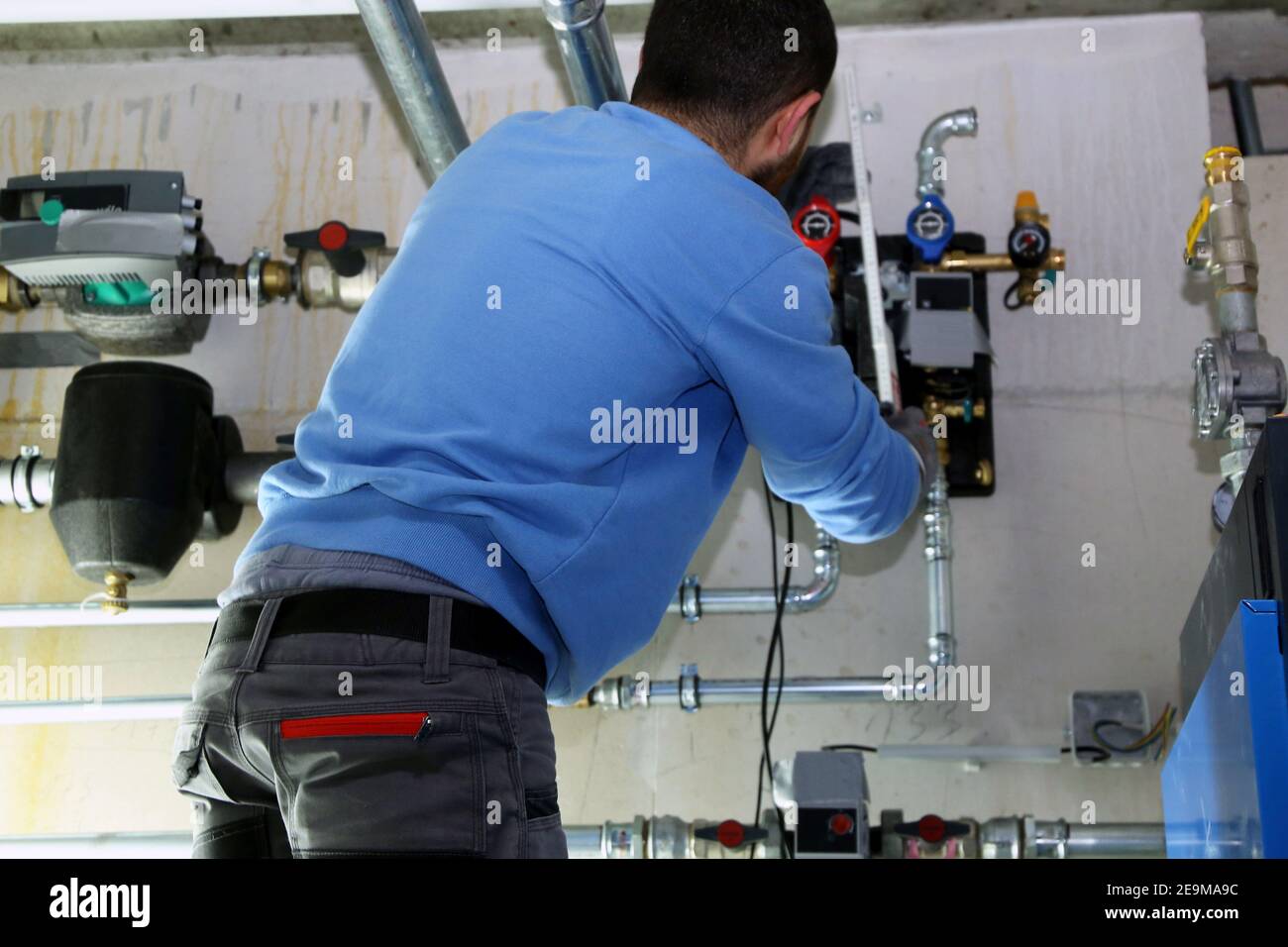 Installation of a heating system in a residential building Stock Photo
