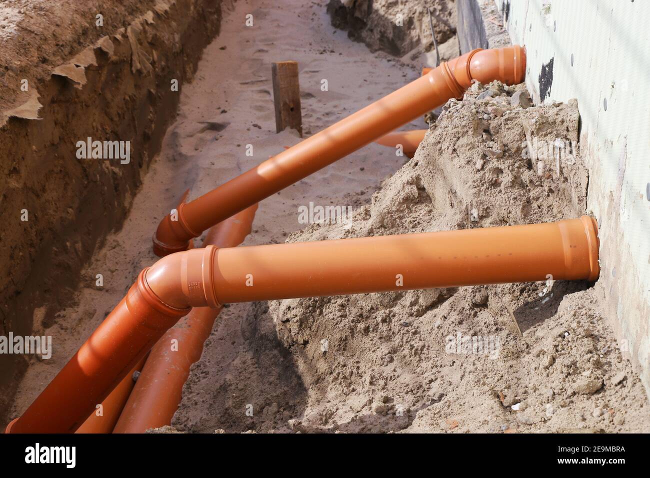 KG sewer pipes on a residential building under construction Stock Photo