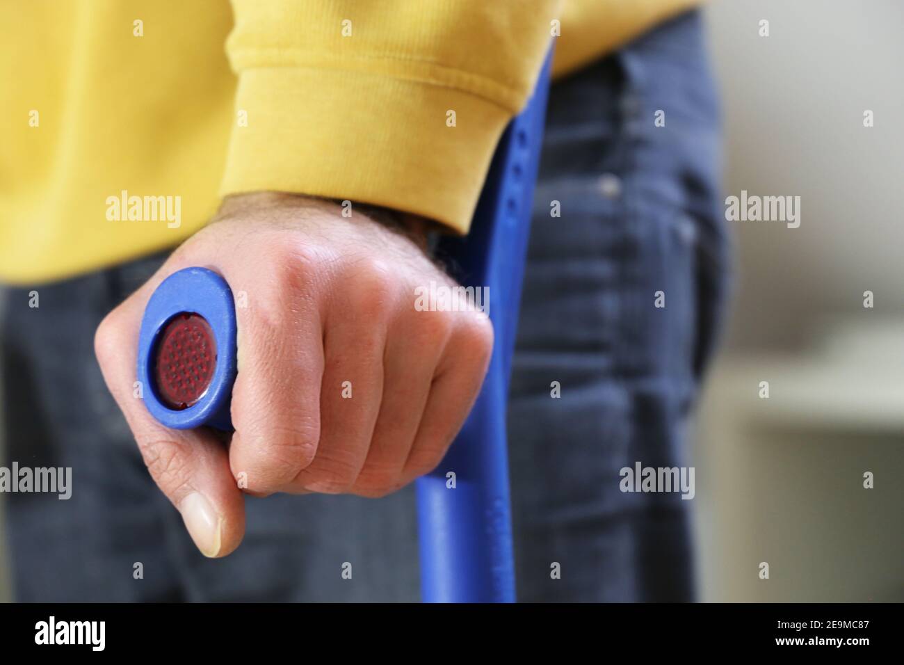 Close up of a man with crutches Stock Photo