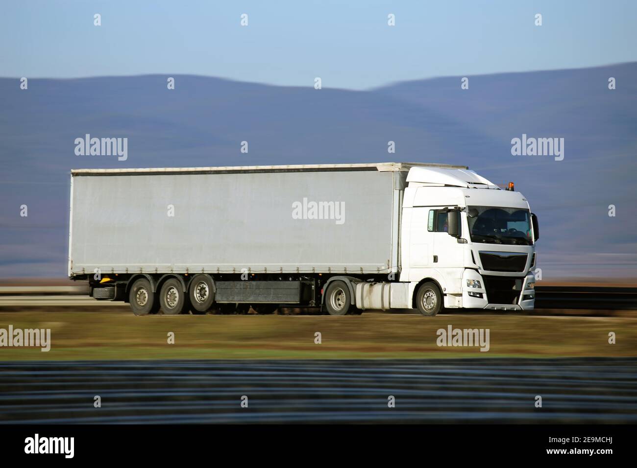 Symbol image: Truck on the highway Stock Photo
