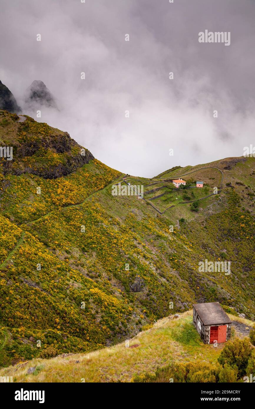 Isolated dwelling in the cloud covered mountains of Madeira, Portugal Stock Photo