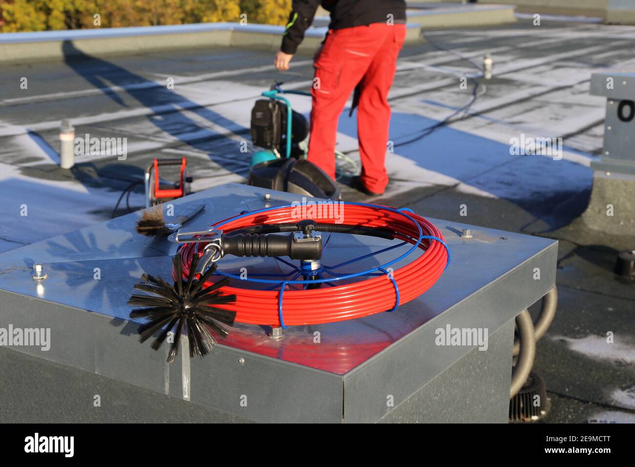 Workers clean the exhaust air ducts of an apartment building (Mannheim, Germany Stock Photo Alamy