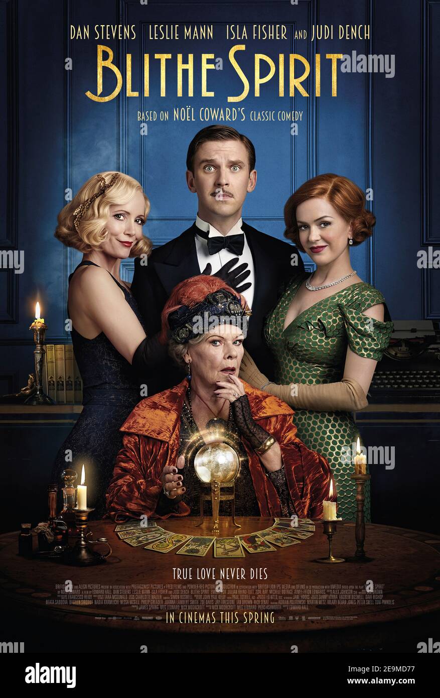 Blithe Spirit (2020) directed by Edward Hall and starring  Dan Stevens, Isla Fisher and Aimee-Ffion Edwards. Adaption of Noël Coward's much loved stage play about a spiritualist medium holds a seance for a writer suffering from writer's block. Stock Photo