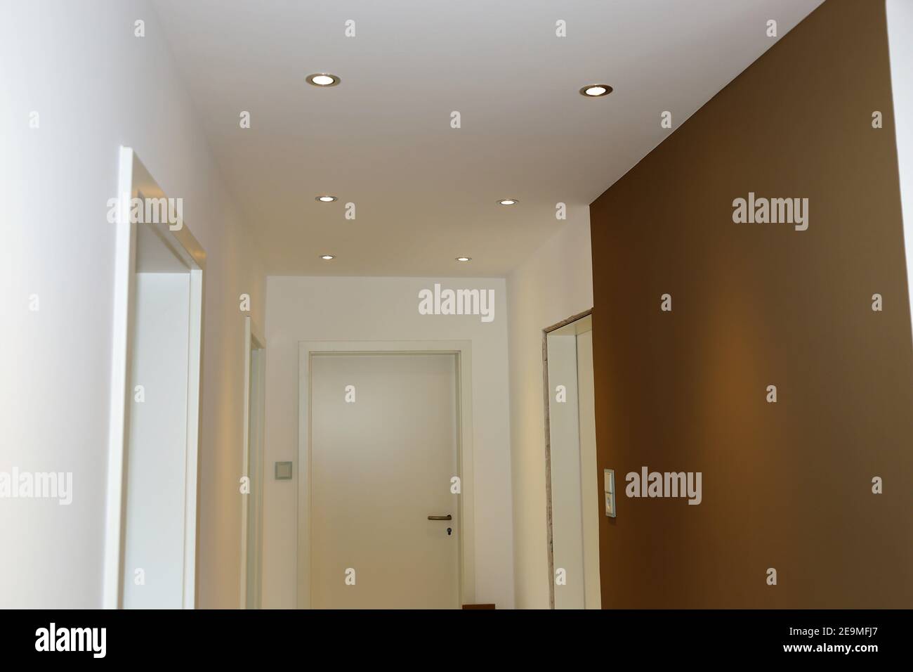 New renovated room with illuminated ceiling Stock Photo