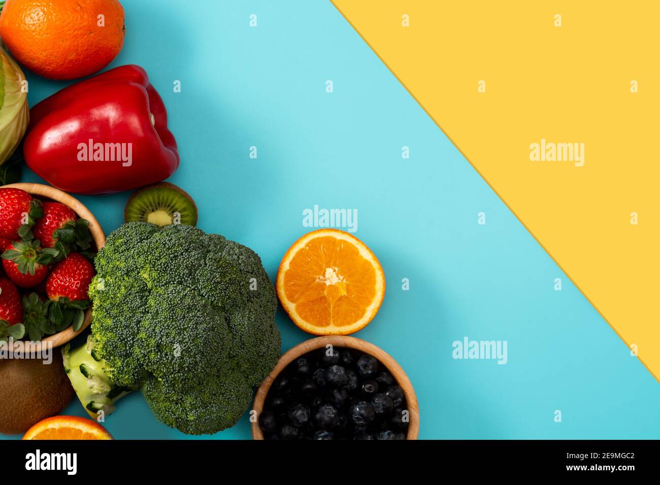 High in vitamin C food on blue background Stock Photo