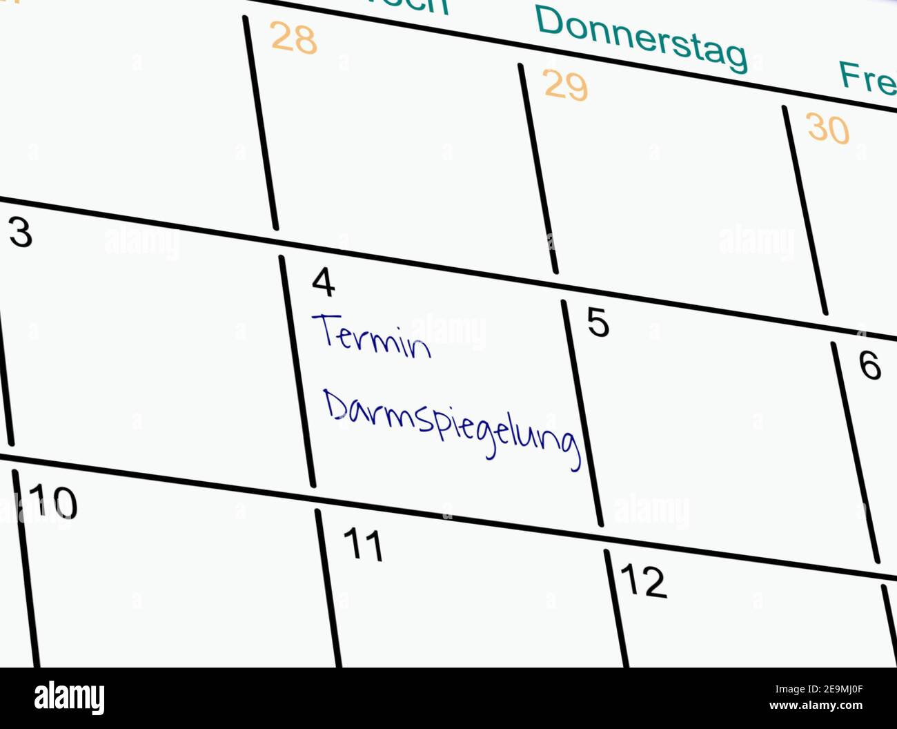 Symbol image: Reminder of a colonoscopy in an appointment calendar (German) Stock Photo
