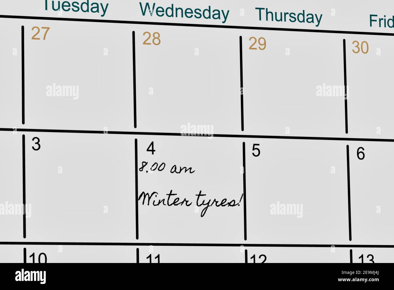 Symbol image: Appointment calendar with note for tire change Stock Photo