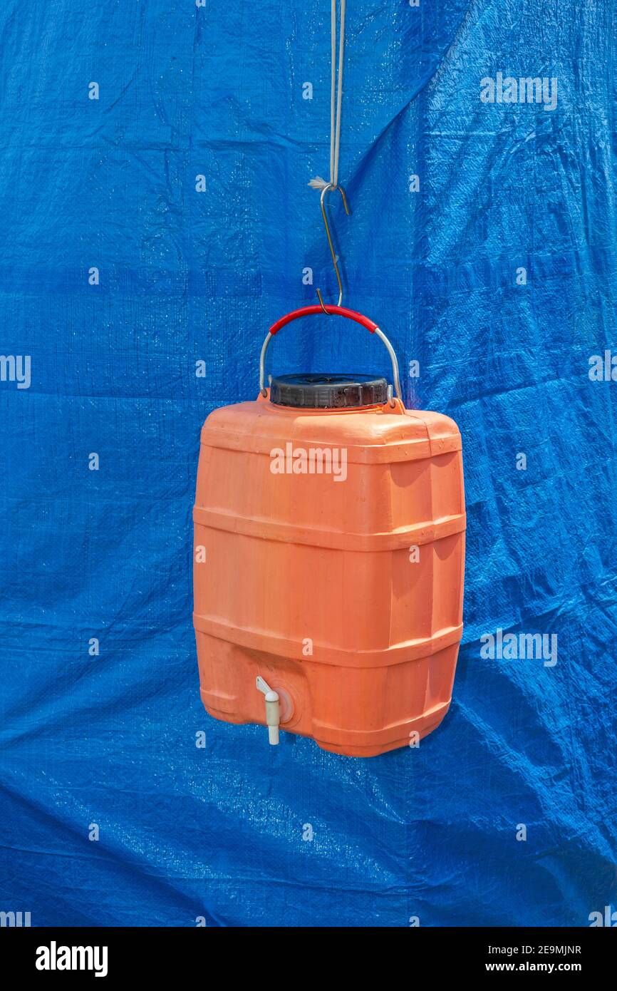 Hanging Water Dispenser Tank With Tap for Camping Stock Photo Alamy