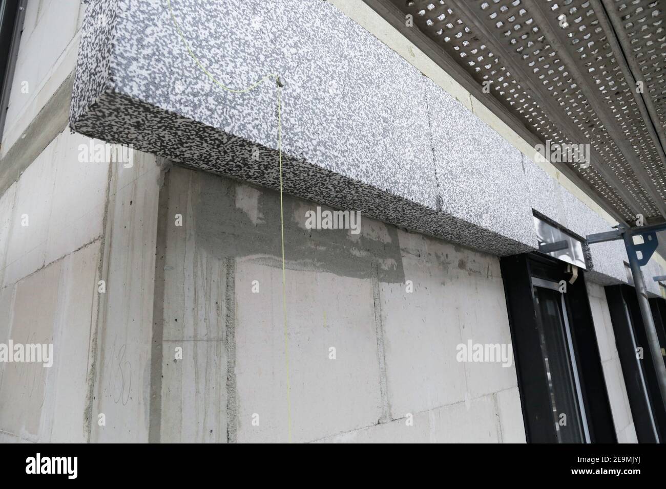 Installation of thermal insulation to a house facade Stock Photo