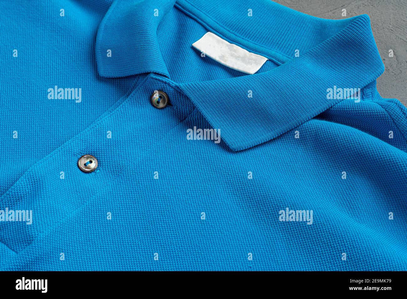 Blue cotton polo t-shirt texture close up Stock Photo - Alamy