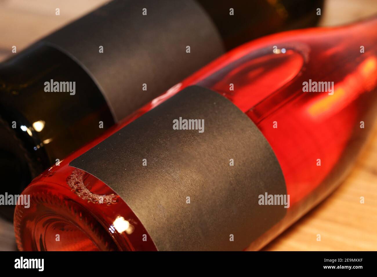 Close up of two lying wine bottles Stock Photo Alamy