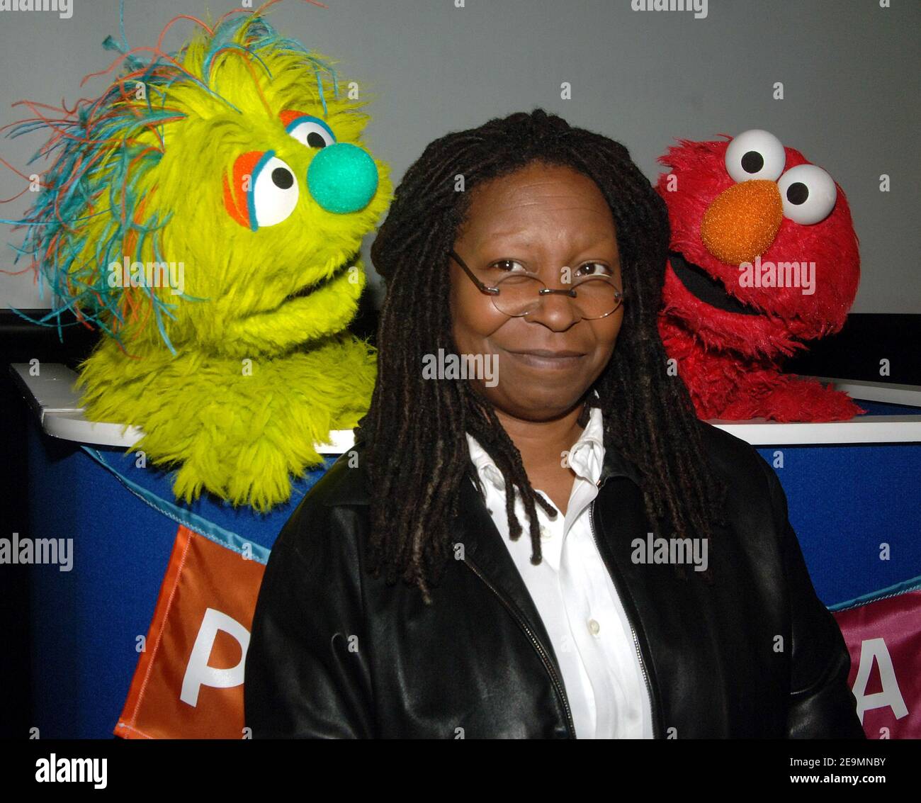 Whoopi Goldberg poses with the new muppet Azibo (left) and Elmo after a press conference to announce "Panwapa", a new world wide initiateve from Sesame Street Workshop at the United Nations International School in New York on October 10, 2007. (Photo by Laura Cavanaugh/Sipa USA) Stock Photo