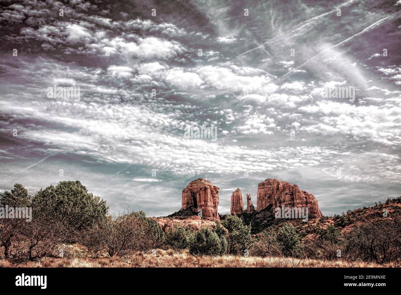 Wind swept clouds cut across the sky above Cathedral Rock in Sedona, Arizona Stock Photo Alamy