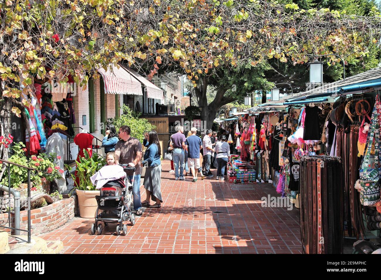 LOS ANGELES, USA - APRIL 5, 2014: People visit Olvera Street market in Los Angeles. Olvera Street is the oldest part of downtown LA. It is California Stock Photo