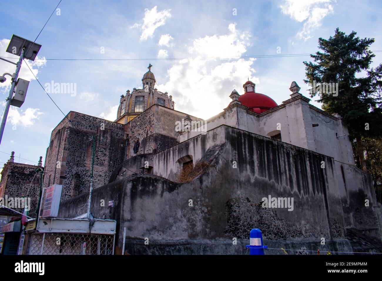 Dome from old Mexican Church under cloudy sky Stock Photo - Alamy