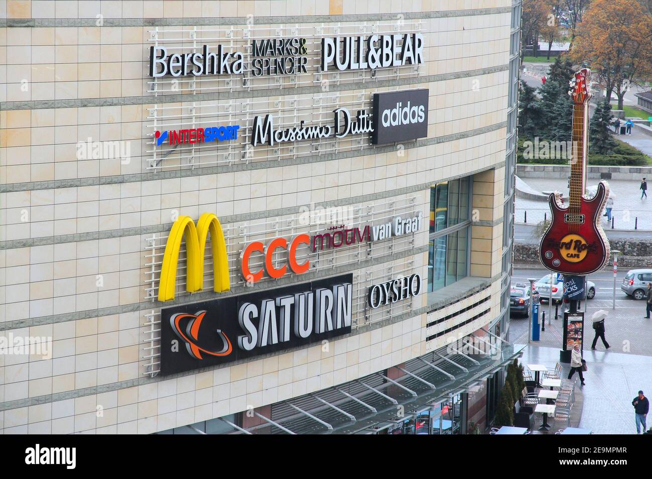 WARSAW, POLAND - APRIL 16, 2014: People visit Zlote Tarasy shopping mall in Warsaw. It was designed by Jerde Partnership and completed in 2007. Stock Photo