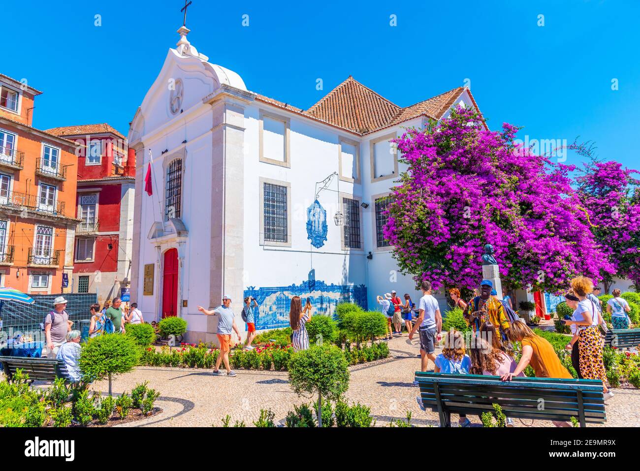 LISBON, PORTUGAL, JUNE 1, 2019:  People are passing by Santa Luzia church in Lisbon, Portugal Stock Photo