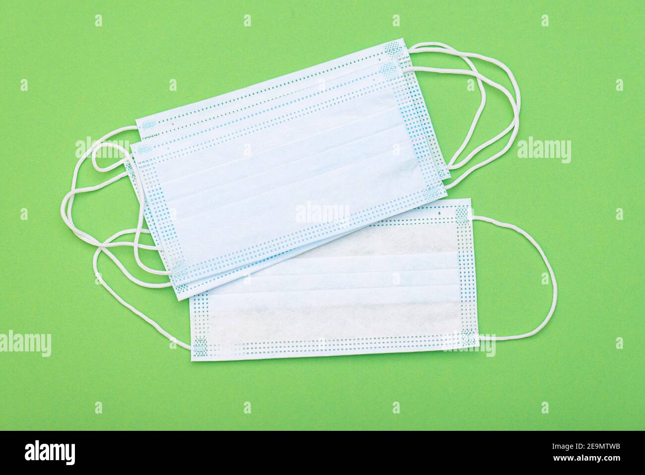Blue medical masks on table hi-res stock photography and images - Alamy