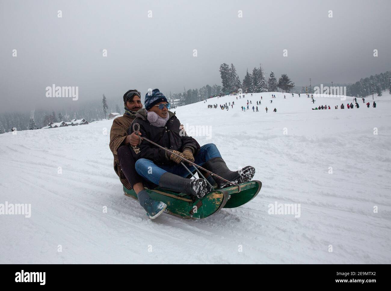 Indian tourists ride on sledge hires stock photography and images Alamy