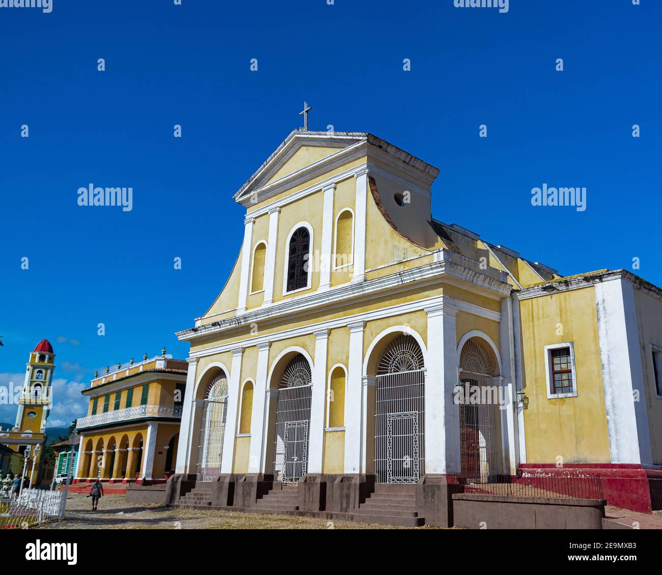 The Church of the Holy Trinity (Iglesia Parroquial de la Santísima Trinidad) in the Plaza Mayor in Trinidad, Sancti Spíritus, Cuba Stock Photo