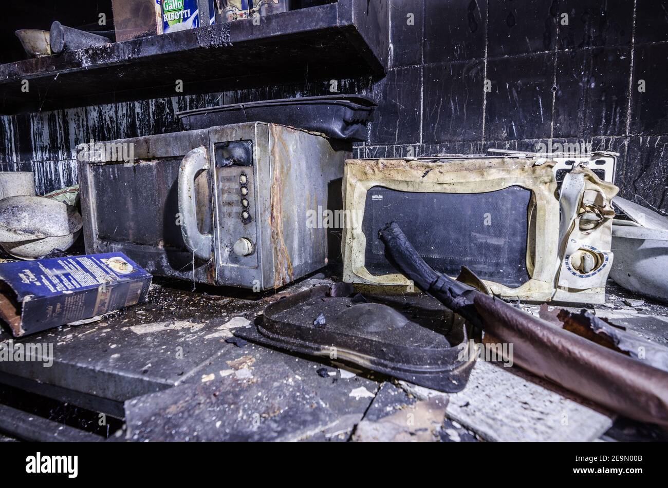 two microwave ovens after a kitchen fire Stock Photo Alamy