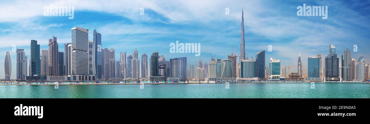 DUBAI, UAE - MARCH 29, 2017: The panorama with the new Canal and skyscrapers of Downtown. Stock Photo