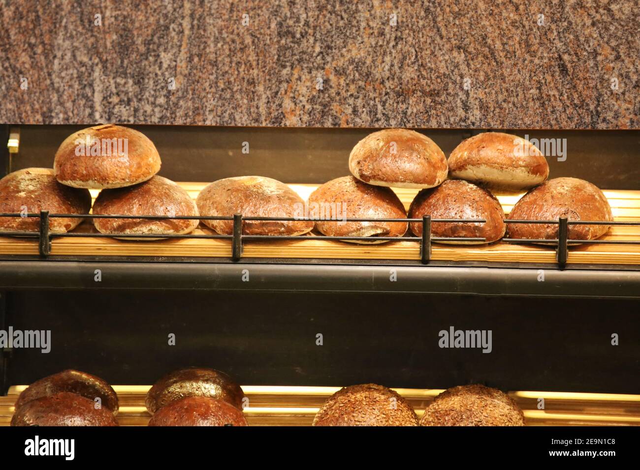 Bakery counter with fresh and crusty bread Stock Photo Alamy