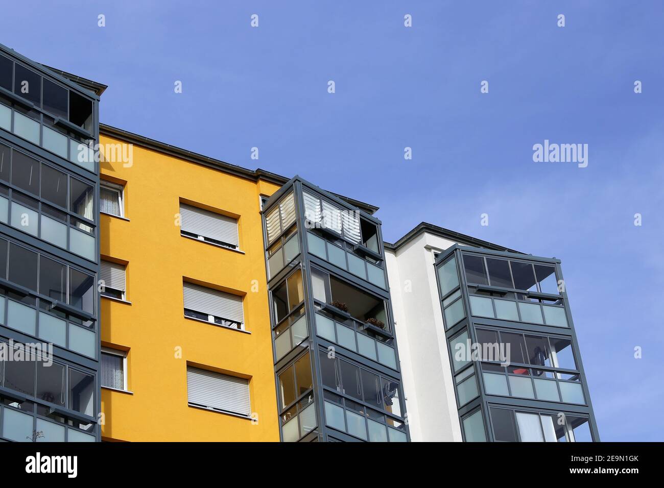 Modern apartment building with glazed balconies Stock Photo - Alamy