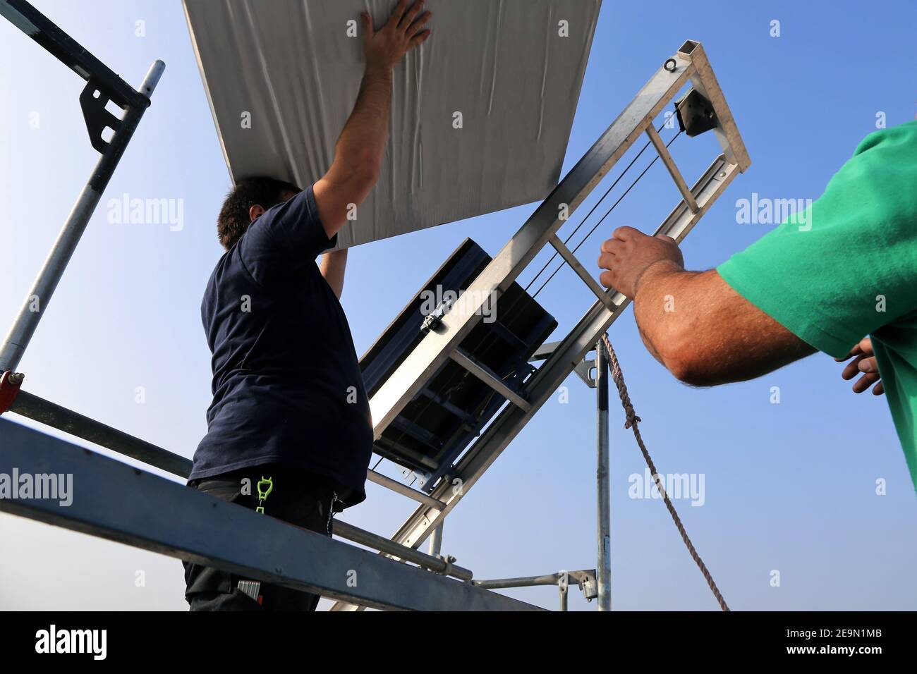 Scaffold with construction hoist Stock Photo Alamy