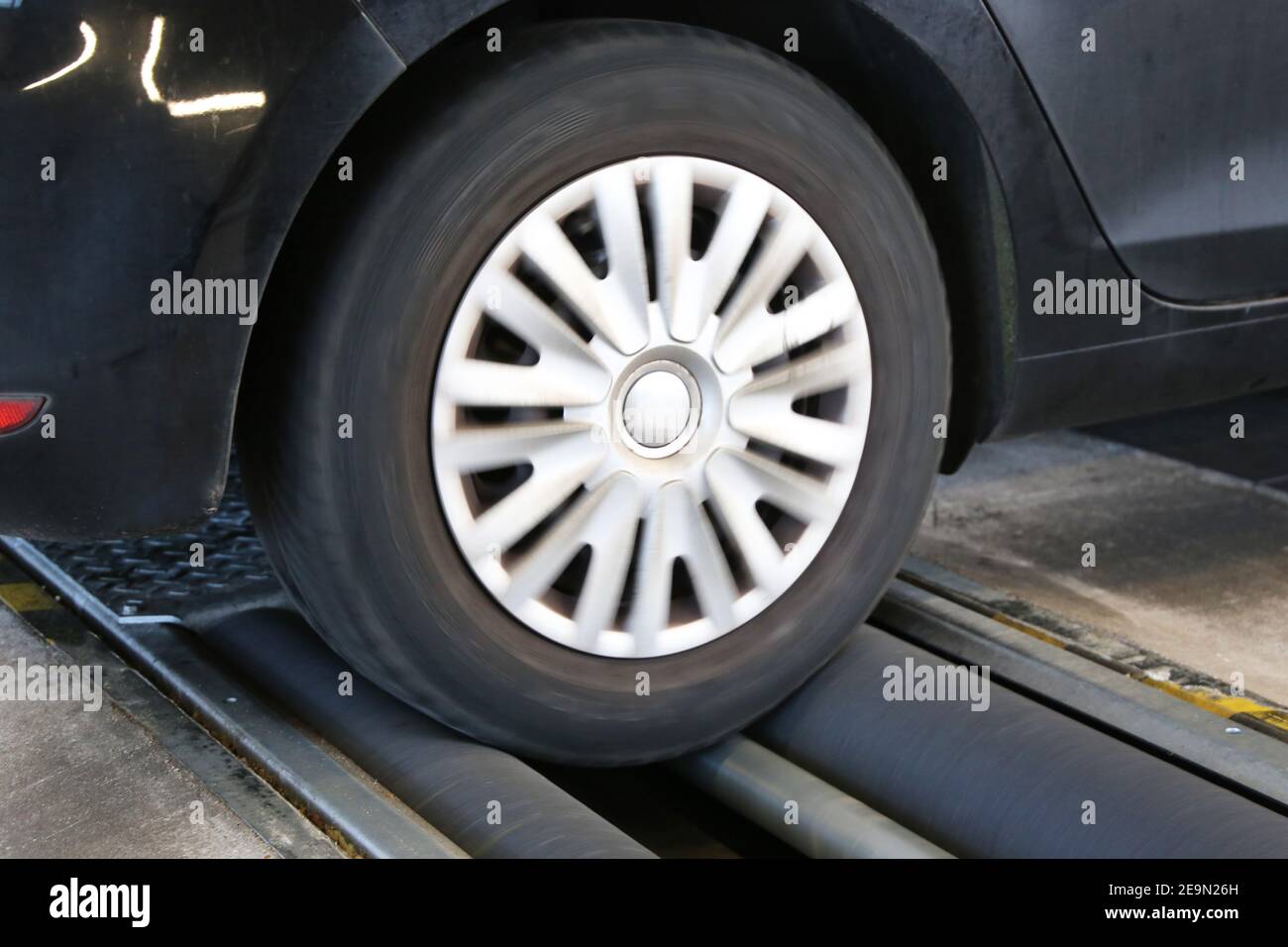 Car on the brake test bench (brake test Stock Photo Alamy