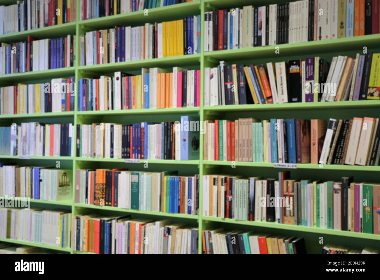 Books on a shelf in an antique shop Stock Photo - Alamy