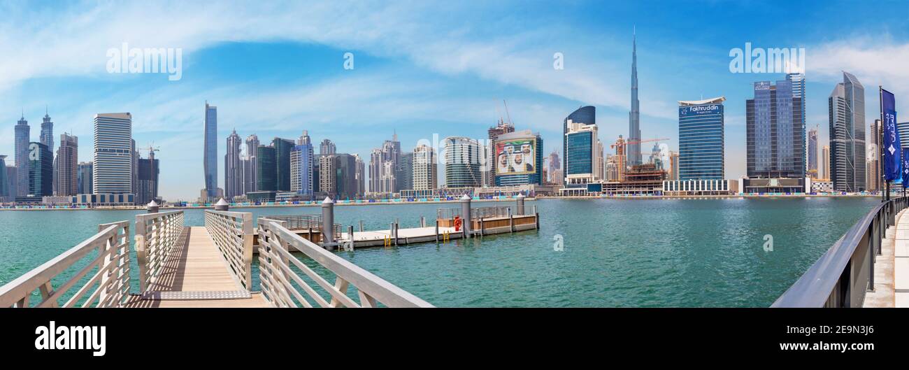 DUBAI, UAE - MARCH 29, 2017: The panorama with the new Canal and skyscrapers of Downtown. Stock Photo
