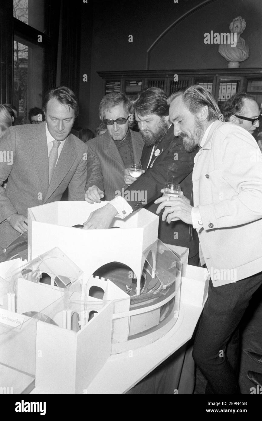 File photo dated 01/12/70 of (left to right), Christopher Plummer, Peter Sellers, George Murcell and Eric Porter, with a model of the project at a reception at the National Portrait Gallery. Christopher Plummer has died aged 91, according to his manager. Issue date: Friday February 5, 2021. Stock Photo