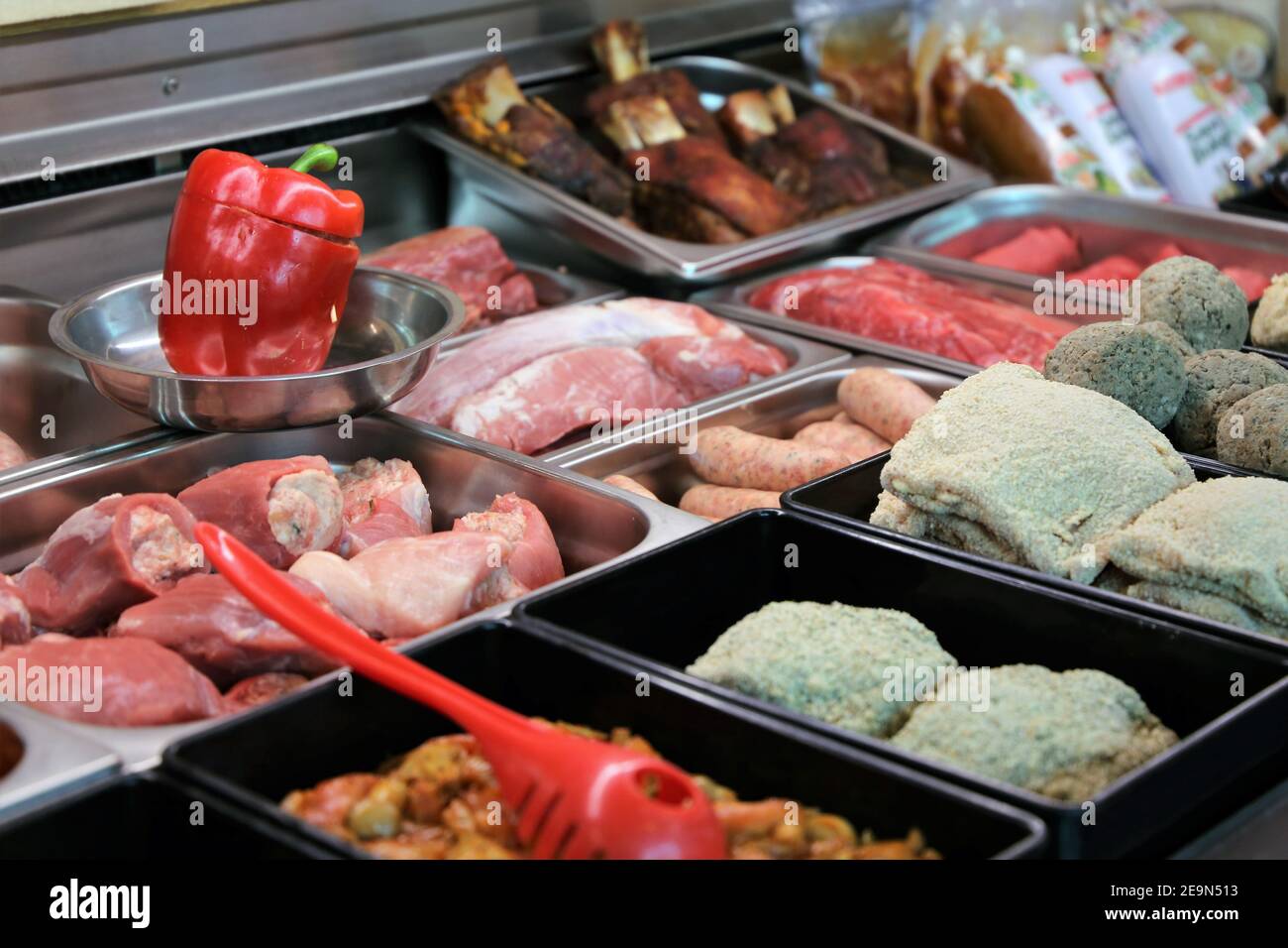 Fine Point Meat Variety of fine meat products in the butchery Stock Photo - Alamy