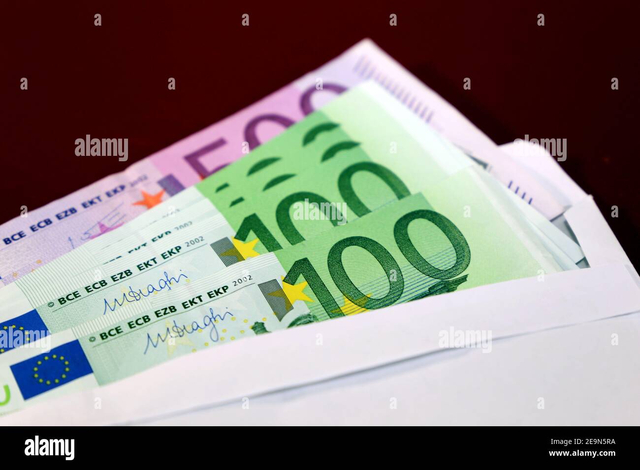 Envelope with Euro bank notes Stock Photo - Alamy