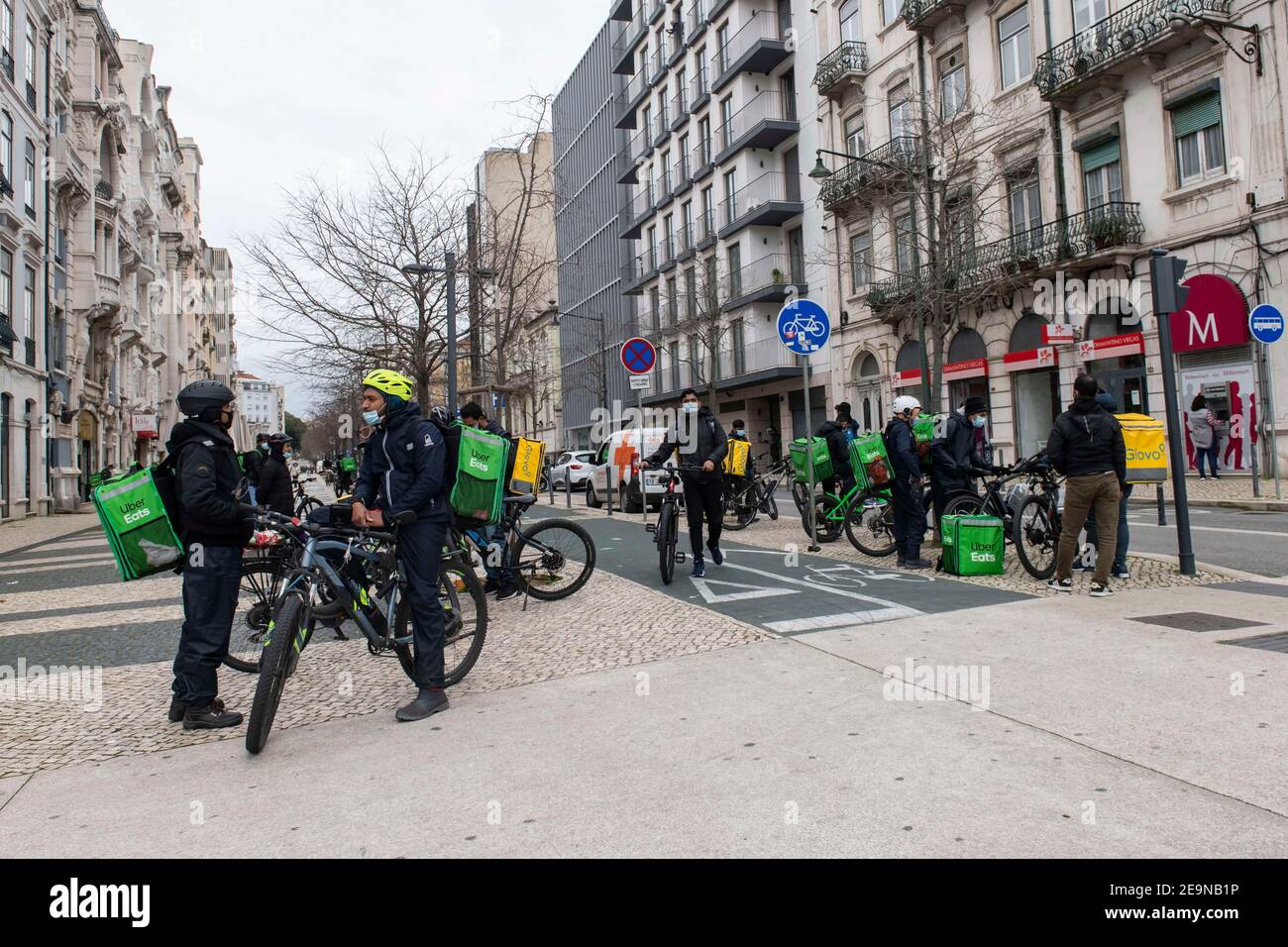 Lisbon, Portugal. 5th Feb, 2021. Uber Eats and Glovo couriers seen 