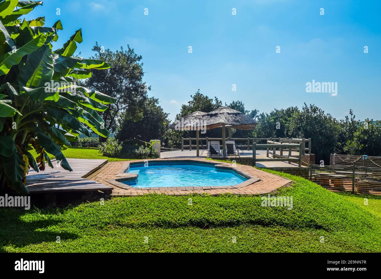 Outdoor and Jacuzzi spa bath overlooking indigenous forest in Sabie