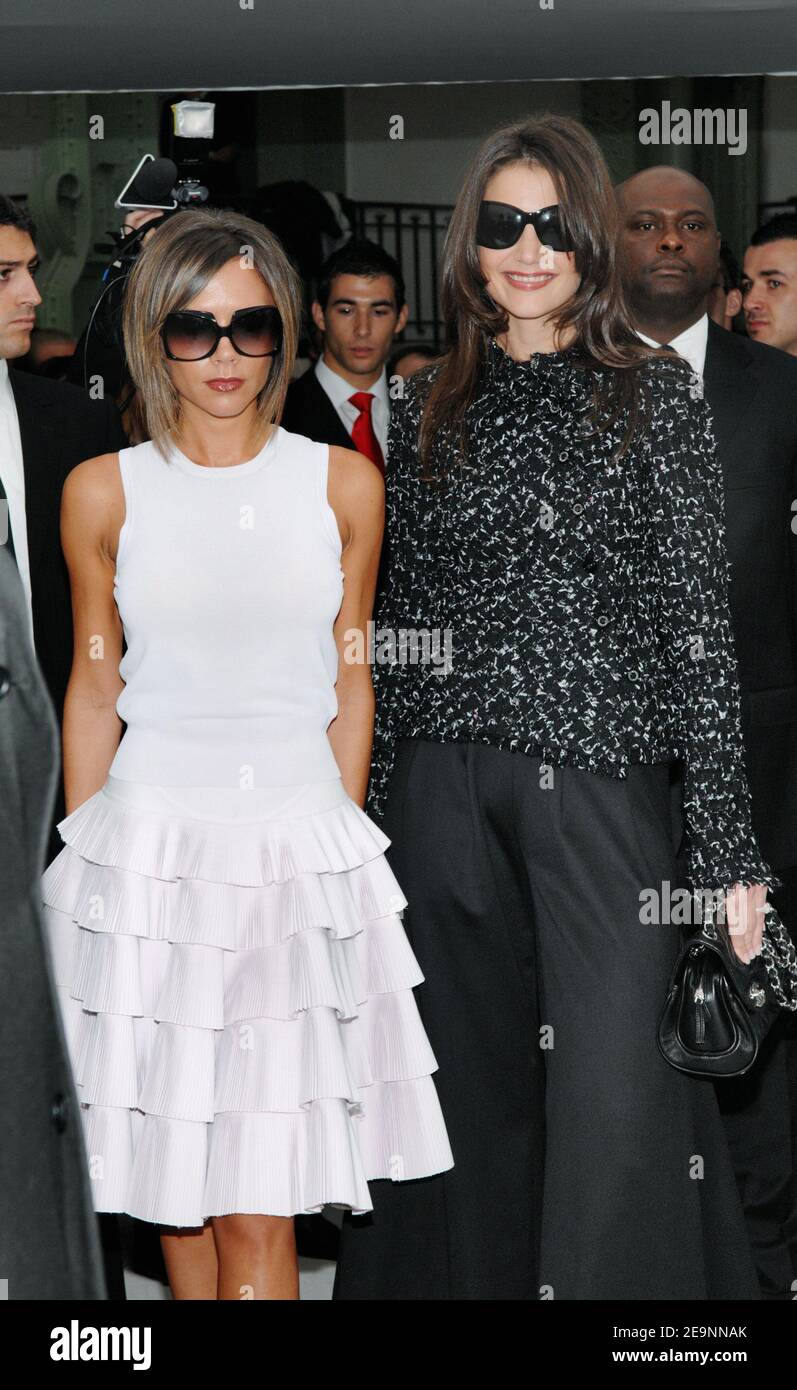 Victoria Beckham and Katie Holmes attend the presentation of Chanel Spring-Summer  2007 Ready-to-Wear collection designed by Karl Lagerfeld held in the 'Grand  Palais' Paris, France on October 6, 2006. Photo by  Khayat-Nebinger-Orban-Taamallah/ABACAPRESS