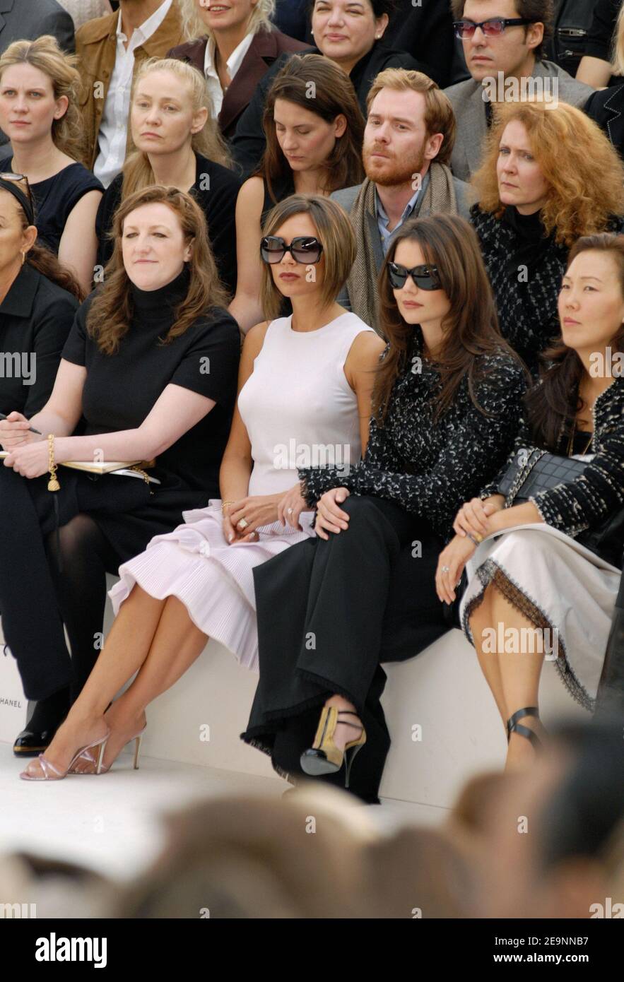 Victoria Beckham and Katie Holmes attend the presentation of Chanel  Spring-Summer 2007 Ready-to-Wear collection designed by Karl Lagerfeld held  in the 'Grand Palais' Paris, France on October 6, 2006. Photo by  Khayat-Nebinger-Orban-Taamallah/ABACAPRESS.COM