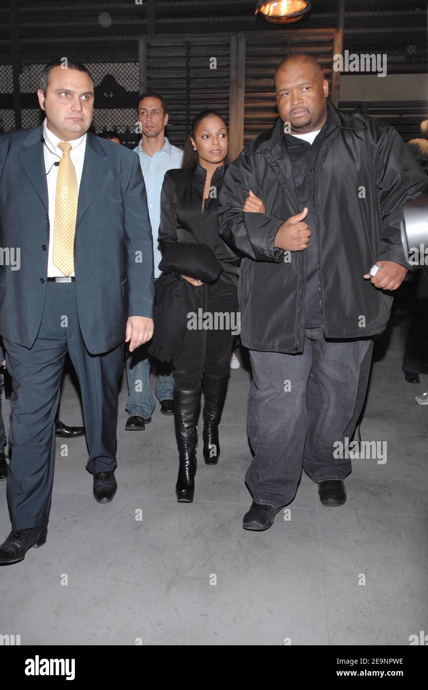 US singer Janet Jackson arrives with her bodyguard for the presentation ...