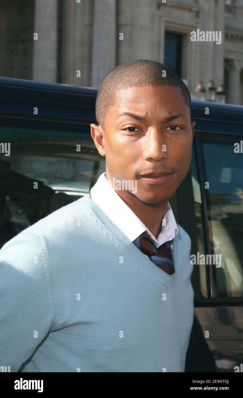 US Singer Pharrell Williams leaves the presentation of Louis Vuitton  Spring-Summer 2007 Ready-to-Wear collection held at Petit Palais in Paris,  France on October 8, 2006. Photo by Gaetan Mabire/ABACAPRESS.COM Stock  Photo -