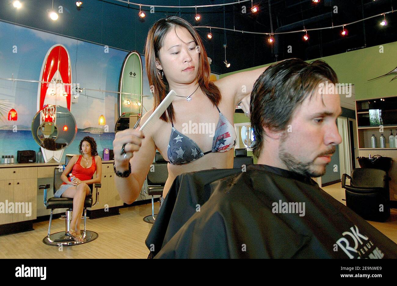 Opening of the first bikini barber shop on October 10 2006 in Fairfax ,  Virginia near Washington DC. Paradise Cuts salon is the first barber shop  in the USA who use stylists