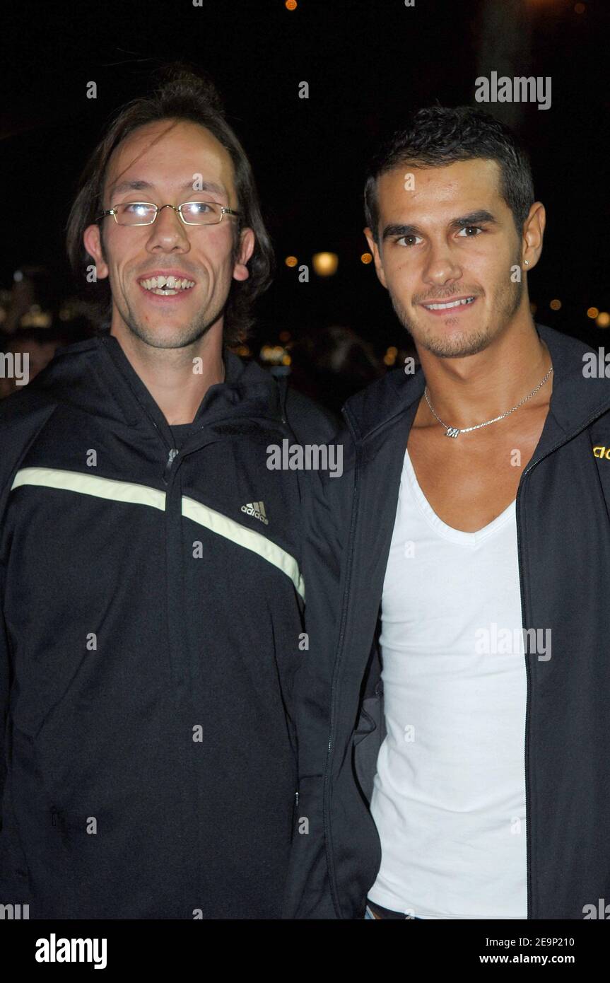 French athlets Mehdi Baala (r) and Yohann Diniz attend the Adidas Flagship store opening party on the Champs Elysees, in Paris, France, on October 24, 2006. Photo by Nicolas Gouhier/Cameleon/ABACAPRESS.COM Stock Photo