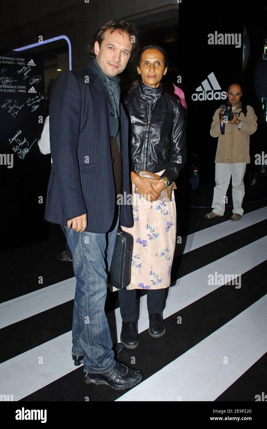 Swiss actor Vincent Perez and his wife Karine Sylla attend the Adidas  Flagship store opening party
