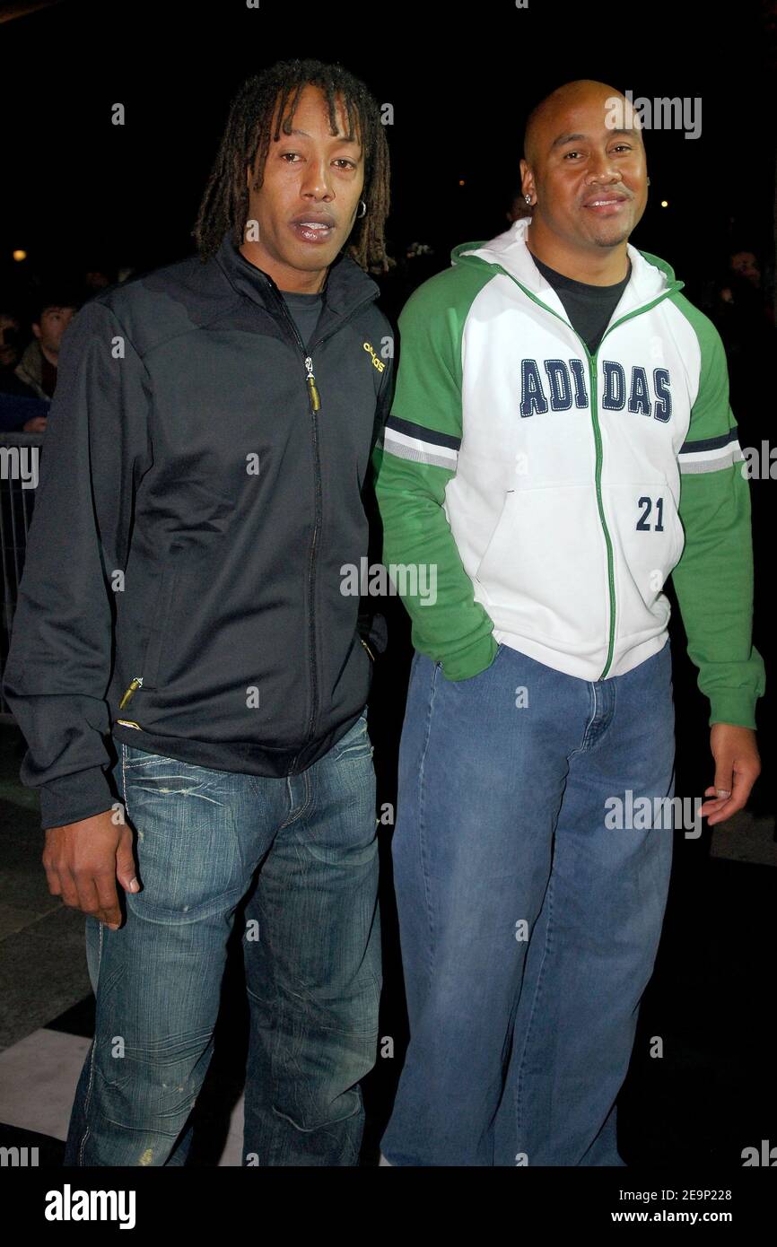 French handball player Jackson Richardson and New Zeland's former rugby  player Jonah Lomu attend the Adidas Flagship store opening party on the  Champs Elysees, in Paris, France, on October 24, 2006. Photo