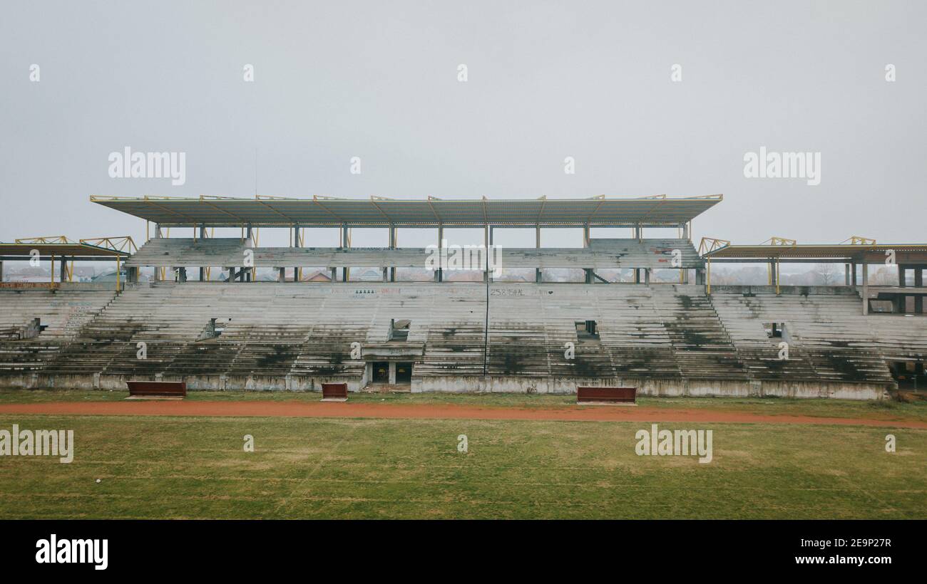 Green stadium with seats in the clear sky background Stock Photo - Alamy